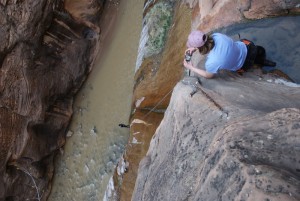 Rachael watches Shaun rap into the Virgin River.